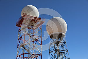 Weather Radar towers Meteorological station on blue sky