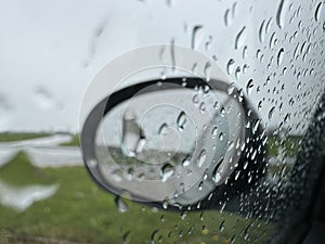 Weather. Rain drops on car window