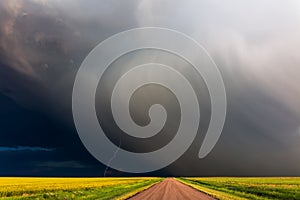 Weather scene with storm clouds, lightning and rain