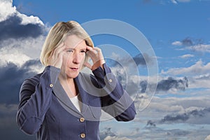 Weather sensitive woman with headache