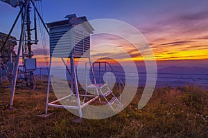 Weather station in sunset mountain