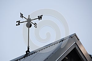 Weather vane on the roof