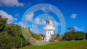 Weatherboard lighthouse at Katiki Point, Otago, New Zealand.