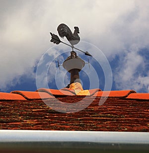 Weathercock on roof