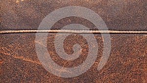 Beige leather surface with seam texture and background