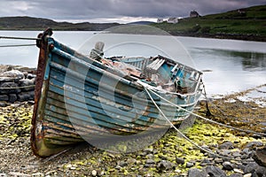 Weathered boat on beach