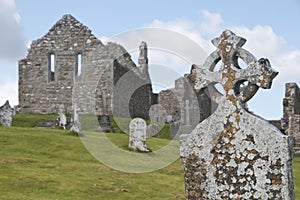 Weathered Celtic Cross at Clonmacnoise monastic site photo