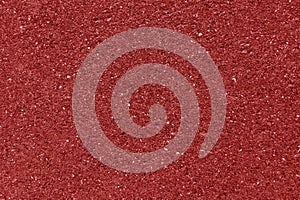 Weathered cement wall texture in red color