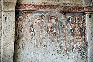 Weathered Christian frescoes in Cappadocia