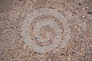 Weathered concrete with stones texture.