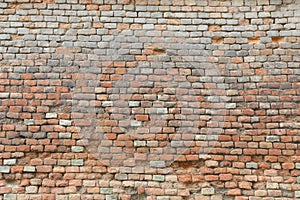 Weathered and damaged brick wall texture