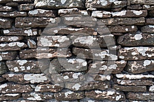 Weathered dry stone wall background