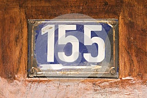 Weathered enameled plate number 155