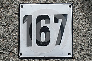 Weathered enameled plate number 167