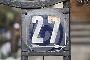 Weathered enameled plate number 27