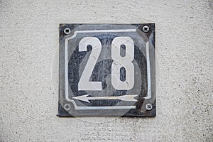 Weathered enameled plate number 28