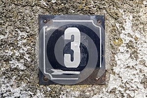 Weathered enameled plate number 3