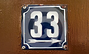 Weathered enameled plate number 33