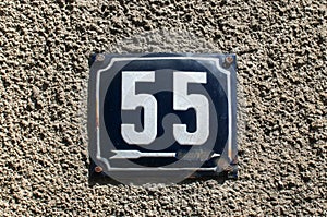 Weathered enameled plate number 55