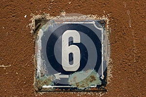 Weathered enameled plate number 6