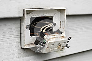 Weathered Exterior Electrical Outlet