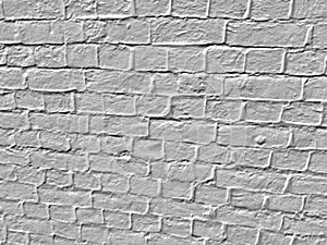 Weathered gray brick wall cement background texture with rough aged surface and rustic stone pattern
