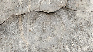 The old concrete surface shows deep cracks.