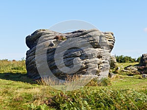 Weathered gritstone rock formation named Victory on birchen Edge