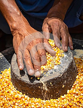 Traditional Corn Grinding on a Stone Mill