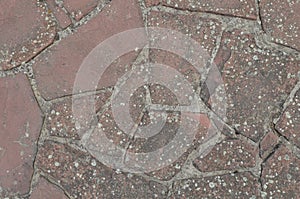 Weathered natural grit stones sidewalk