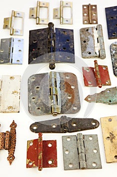 Weathered old hinges to be reused