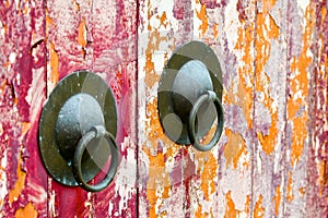 Weathered old oriental doorknock