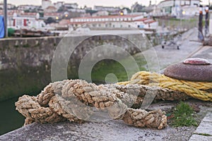 Weathered old sea rope on a cost