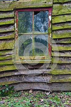 Weathered old shed with window