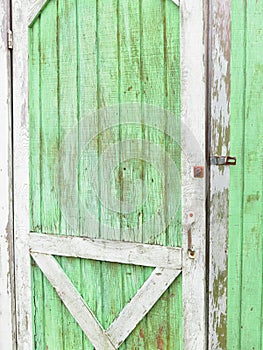 Weathered paint on shed door