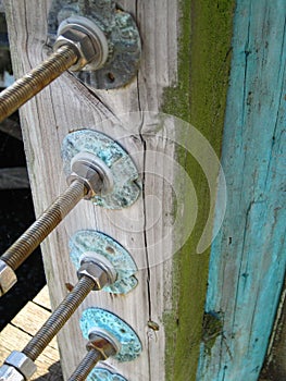 Weathered post on harbor peer