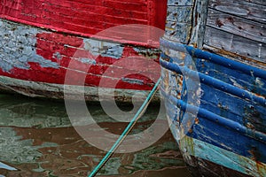 Weathered Red and Blue Boat Hulls