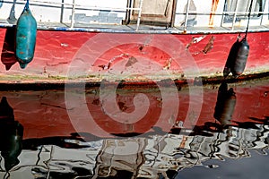 Weathered red ship`s hull