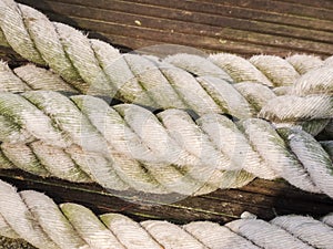 Weathered ropes on wood planks
