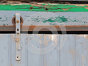 Weathered rustic old sliding gate details