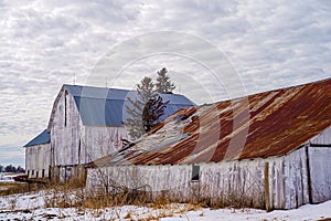 Weathered shed and barn, winter, wisconsin