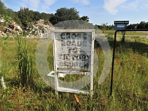 Weathered sign for church, central Florida