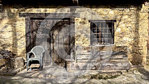Rustic stone house facade with wooden door and vintage elements photo