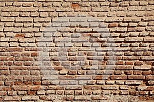 Texture of brown mud brick wall