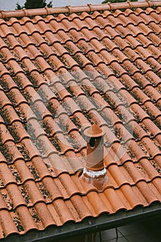 Weathered tiled roof of a house