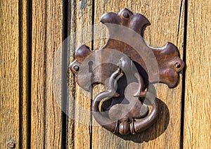 Weathered vintage metal lock plate and door knocker