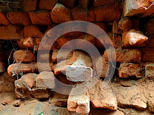 Weathered Walls Red bricks Broken Bricks and decayed Bricks in a wall