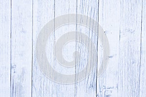 Weathered whitewash blue tint wood textured material background