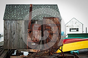 Weathered wood shack on Gloucester dock