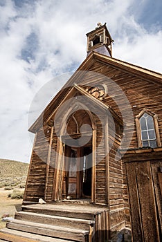 Weathered wooden church in ghost town of Bodie, California, USA